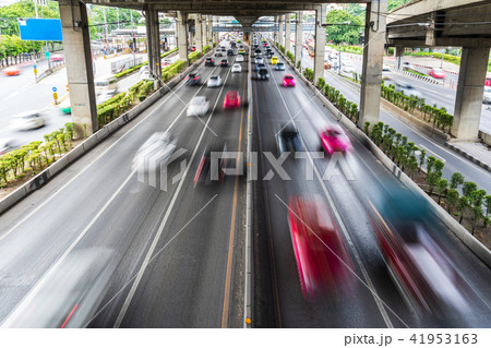 Motion blur of car on the road in the city 41953163