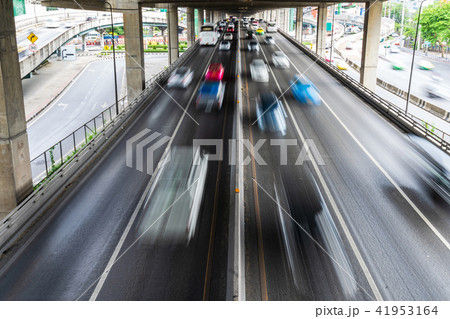 Motion blur of car on the road in the city 41953164