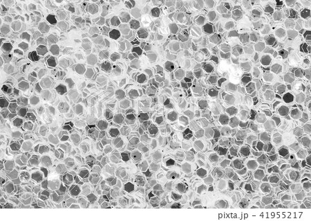Bright light background with dark spangles. Bright light background with dark spangles. 41955217