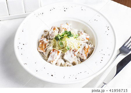 Pasta spaghetti with salmon, cheese and herbs Pasta spaghetti with salmon, cheese and herbs 41956715