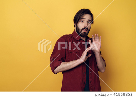 Portrait of Indignation Man Looking at Camera Portrait of Indignation Man Looking at Camera 41959853