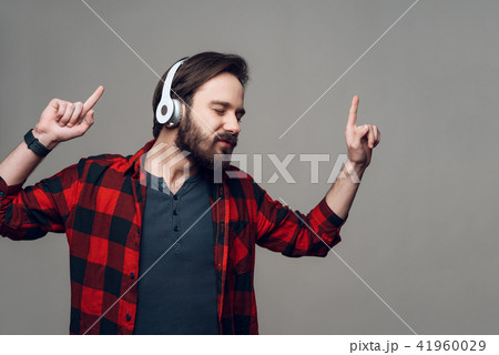 Happy Guy Listening to Music with Headphones 41960029