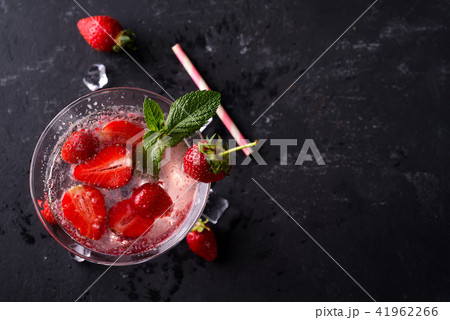 Cocktail strawberry margarita on the slate dark background, copy space. Flat lay Cocktail strawberry margarita on the slate dark background, copy space. Flat lay 41962266
