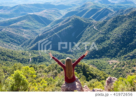 Beautiful women showing peace sign 41972656