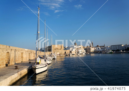 Boats in Monopoli port, Castle of Carlo V, Italy Boats in Monopoli port, Castle of Carlo V, Italy 41974075