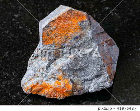 raw Hematite ore on black granite 41975437