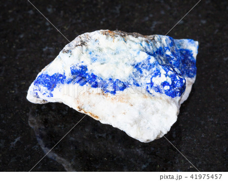 raw Lazurite (Lapis Lazuli) gemstone on black raw Lazurite (Lapis Lazuli) gemstone on black 41975457