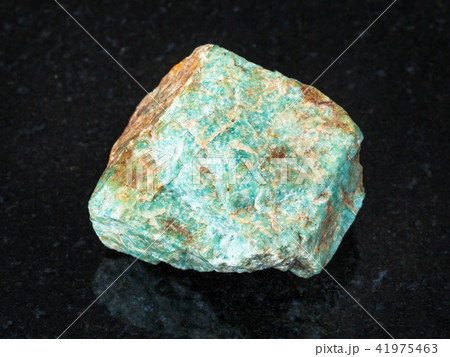 raw Amazonite stone on black 41975463