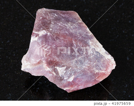 rough pink Flint stone (Chalcedony) on black rough pink Flint stone (Chalcedony) on black 41975659