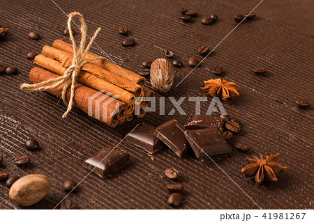 sweets, cinnamon sticks and chocolate sweets, cinnamon sticks and chocolate 41981267