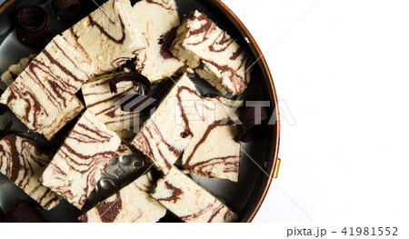 Halva with cacao pieces on a plate 41981552