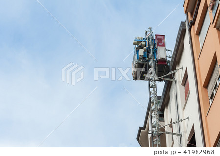 Elevator construction attached to the wall. Elevator construction attached to the wall. 41982968