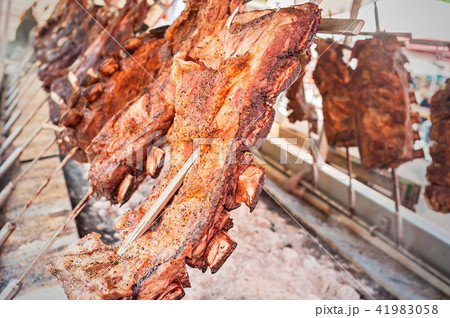 Roasted meat of beef cooking. Asado is traditional Roasted meat of beef cooking. Asado is traditional 41983058
