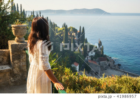 Traveller enjoys scenic view of Trsteno, Croatia. 41986957