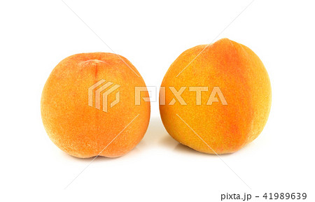 Fresh peaches isolated on white background Fresh peaches isolated on white background 41989639