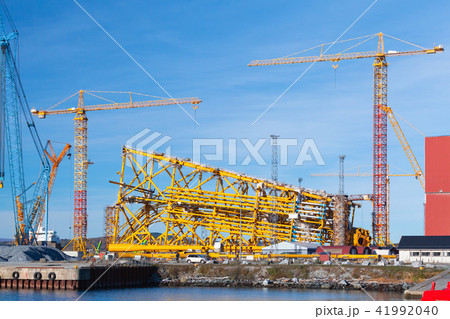 Industrial landscape with cranes. Norway Industrial landscape with cranes. Norway 41992040