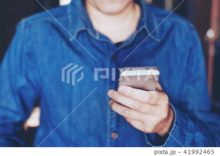 Businessman using mobile online icon social 41992465