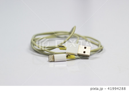the broken USB smartphone charger cable 41994288