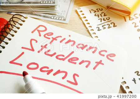 Refinance Student Loans form on a desk. Refinance Student Loans form on a desk. 41997200