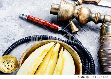 oriental shisha with melon oriental shisha with melon 41997488