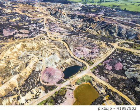 The colourful remains of the former copper mine Parys Mountain near Amlwch on the Isle of Anglesey The colourful remains of the former copper mine Parys Mountain near Amlwch on the Isle of Anglesey 41997902
