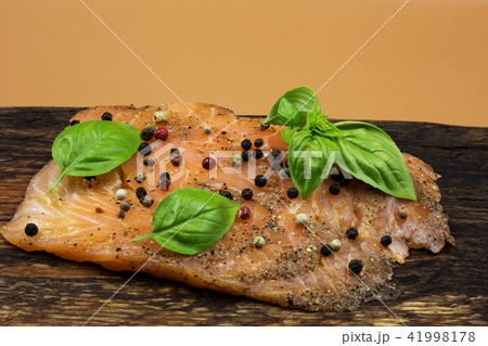 Smoked salmon on a wooden board Smoked salmon on a wooden board 41998178