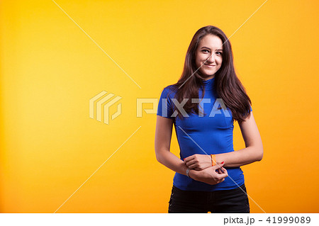 Beautiful young woman smiling Beautiful young woman smiling 41999089