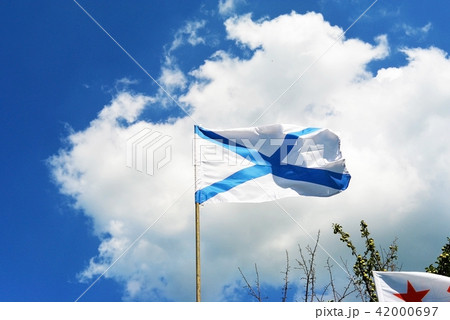 Naval flag of the Russian Navy St. Andrew on a blue sky 42000697