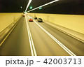 Motion Blur of car driving through tunnel 42003713