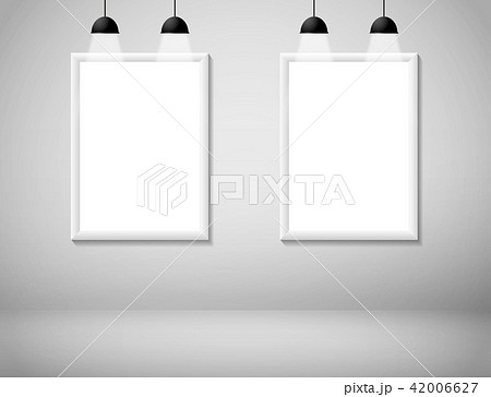 Blank white frame on wall with lamp Blank white frame on wall with lamp 42006627