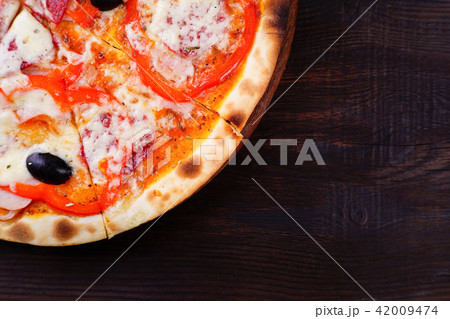 Sliced Italian pizza, food background, free space 42009474