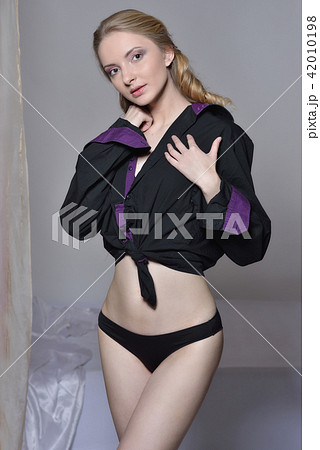 Sexy beautiful woman with in white blouse 42010198