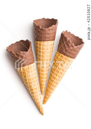 Ice cream cone with chocolate. Ice cream cone with chocolate. 42010827