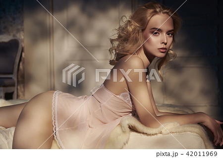 Sensual blonde in her boudoir 42011969