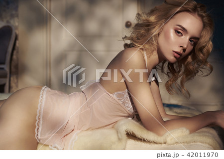 Sensual blonde in her boudoir Sensual blonde in her boudoir 42011970