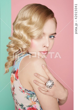 Blonde woman with color makup on colorful background 42015041
