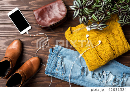 Casual female warm clothing. Fashion background Casual female warm clothing. Fashion background 42031524
