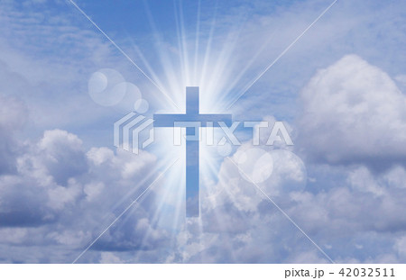 Christian cross appears bright in the sky Christian cross appears bright in the sky 42032511