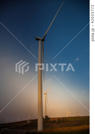 Wind turbine farm of silhouette at sunset. Wind turbine farm of silhouette at sunset. 42033772