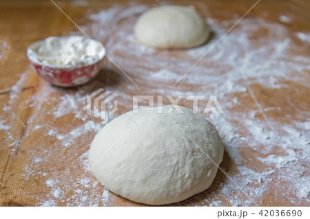 Homemade dough in a cuisine on the table Homemade dough in a cuisine on the table 42036690