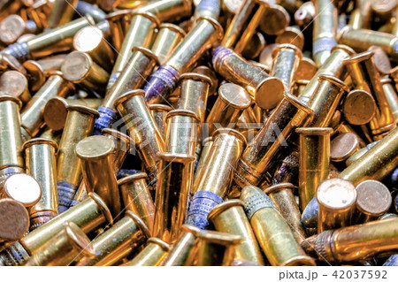 Closeup pile of bullets golden Closeup pile of bullets golden 42037592