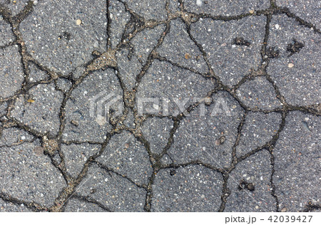 cracks on the asphalt pattern texture background 42039427