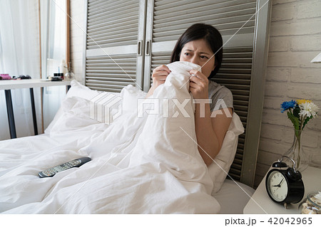woman cover her sight with blanket woman cover her sight with blanket 42042965