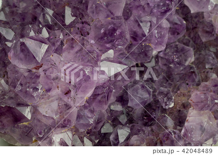 Amethyst geode background. 42048489