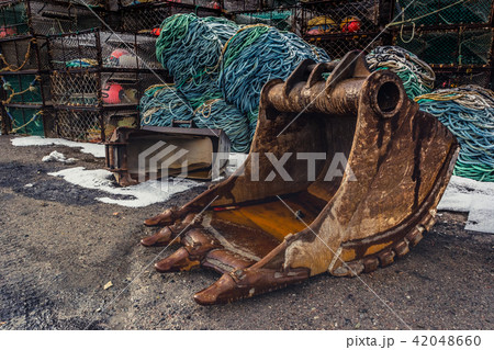 Shovel bucket on the ground Shovel bucket on the ground 42048660