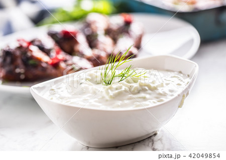 Greek dip sauce or dressing tzatziki 42049854