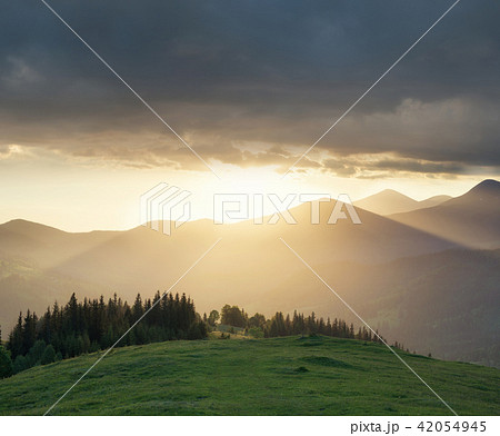 Mountain valley during sundown.  42054945