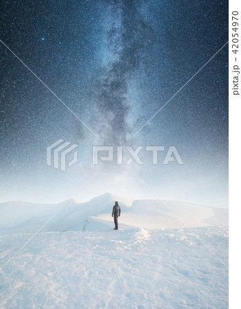 Tourist on the night sky background 42054970