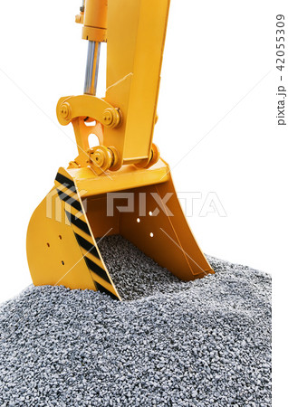 bucket scoops the gravel on the construction site bucket scoops the gravel on the construction site 42055309