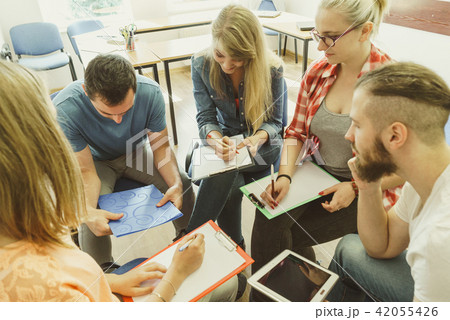 Group of people students working together Group of people students working together 42055426